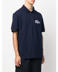 Polo brodé bleu marine Lacoste