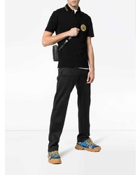 Polo brodé noir Versace