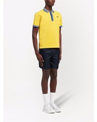 Polo imprimé moutarde Prada