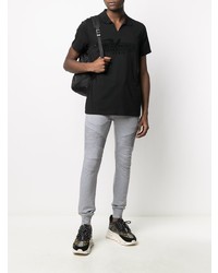 Polo imprimé noir Balmain