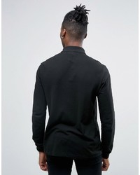 Polo noir Lacoste