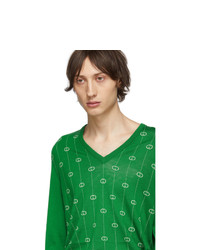 Pull à col en v imprimé vert Gucci