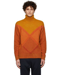 Pull à col roulé à losanges orange