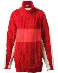 Pull à col roulé en tricot rouge