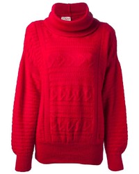 Pull à col roulé en tricot rouge