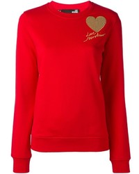 Pull pailleté rouge Love Moschino
