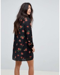 Robe chemise à fleurs noire