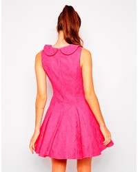 Robe patineuse en dentelle fuchsia