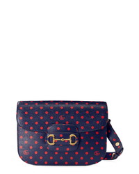 Sac bandoulière en cuir á pois bleu marine