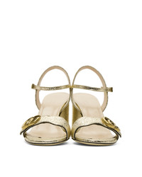 Sandales à talons en cuir dorées Gucci