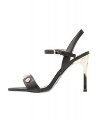 Sandales à talons en cuir noires Versace
