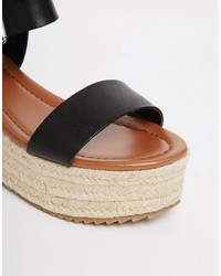 Sandales compensées en cuir noires Steve Madden
