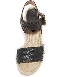 Sandales compensées en cuir noires Soludos