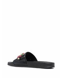 Sandales en cuir noires Moschino