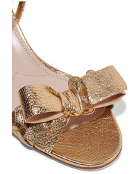 Sandales en cuir texturées dorées Miu Miu