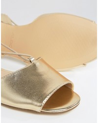 Sandales plates dorées Aldo