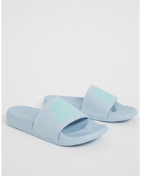 Sandales plates en caoutchouc imprimées bleu clair Juicy Couture