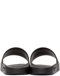 Sandales plates en caoutchouc noires Givenchy