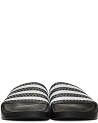 Sandales plates en caoutchouc noires adidas