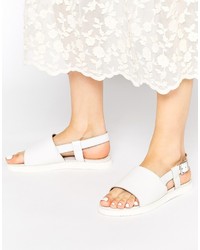 Sandales plates en cuir blanches