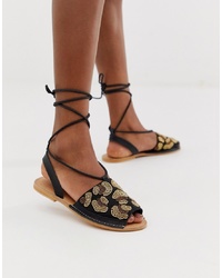Sandales plates en cuir imprimées léopard noires ASOS DESIGN
