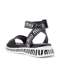 Sandales plates en cuir noires et blanches Miu Miu