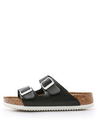 Sandales plates en cuir noires Birkenstock