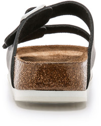 Sandales plates en cuir noires Birkenstock