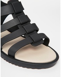 Sandales plates en cuir noires Melissa