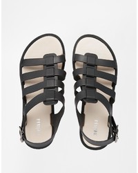 Sandales plates en cuir noires Melissa