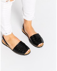 Sandales plates en cuir noires