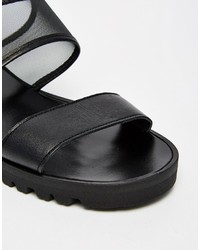 Sandales plates en cuir noires Pieces
