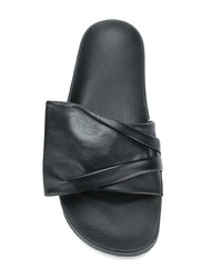 Sandales plates en cuir noires Clergerie
