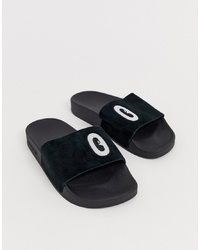 Sandales plates en daim noires adidas Originals