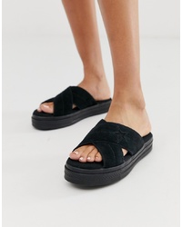 Sandales plates en daim noires Converse