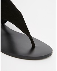 Sandales plates en daim noires