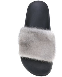 Sandales plates en fourrure noires Givenchy