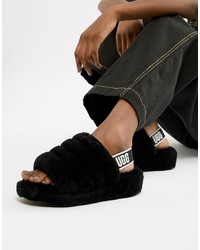 Sandales plates en fourrure noires UGG