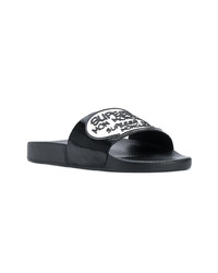 Sandales plates imprimées noires Moncler