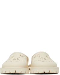 Slippers en caoutchouc blancs Gucci