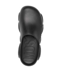 Slippers en caoutchouc noirs Moschino