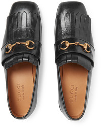 Slippers en cuir à franges noirs Gucci