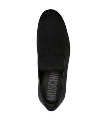 Slippers en cuir imprimés noirs Moschino