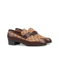 Slippers en cuir marron foncé Gucci