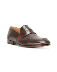 Slippers en cuir marron Gucci