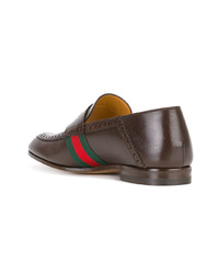 Slippers en cuir marron Gucci