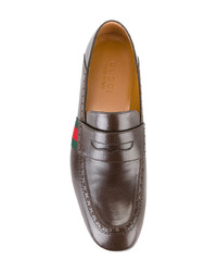 Slippers en cuir marron Gucci