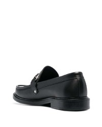 Slippers en cuir noirs et blancs Moschino