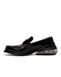 Slippers en cuir noirs Maison Margiela