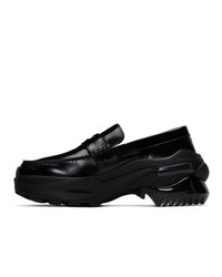 Slippers en cuir noirs Maison Margiela